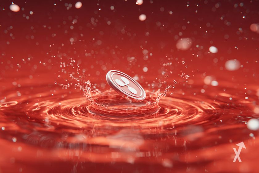 Une pièce de XRP tombant dans une marée rouge