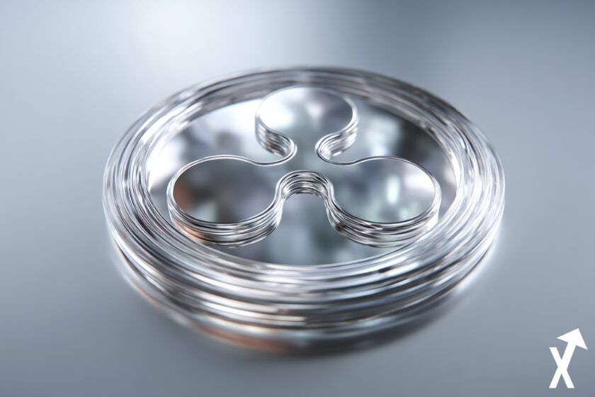 ripple rlusd coin argenté sur fond argenté.