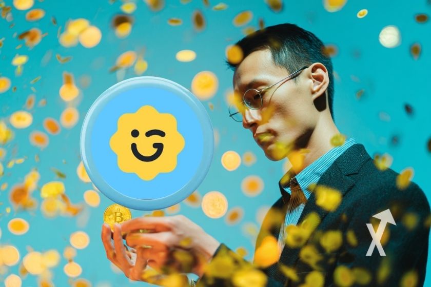 Jetoin GIGGLE tenu par CZ dans ses maines sur un fond bleu avec des cryptos tokens jaunes partout