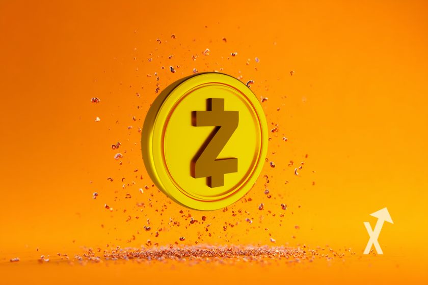 coin Zcash ZEC en jaune sur un fond orange avec des morceaux de terre autour