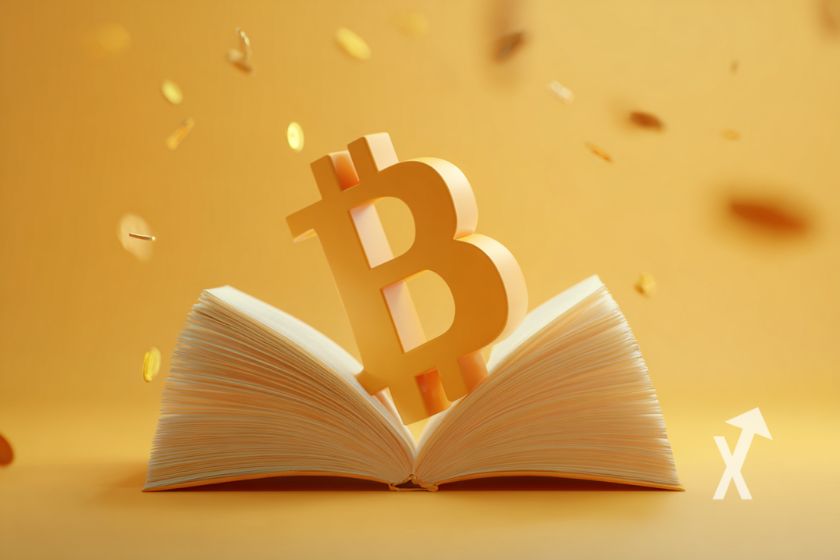 Bitcoin logo en jaune sur un journal ouvert sur un fond jaune
