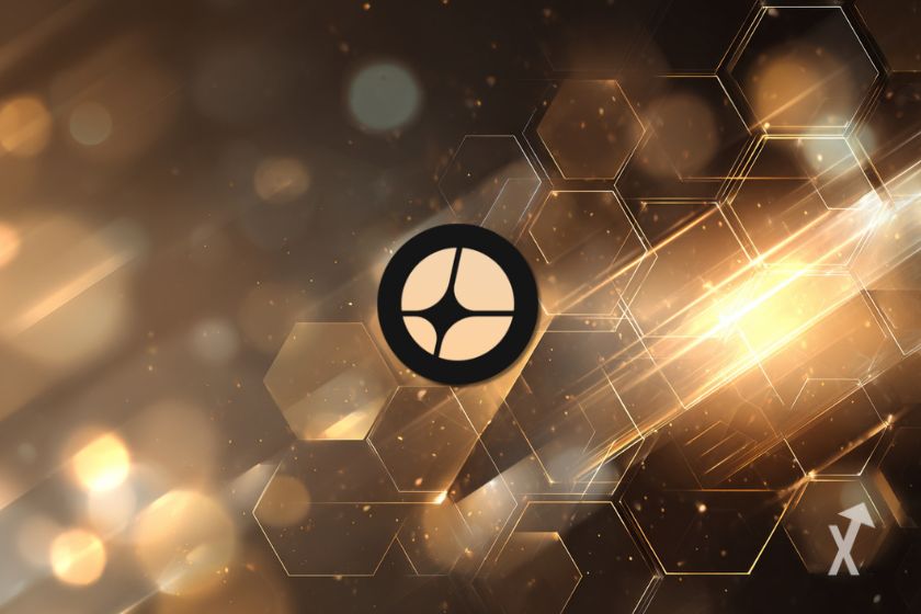 Le logo arrondi de Aster sur un fond de couleur bronze avec des lumières