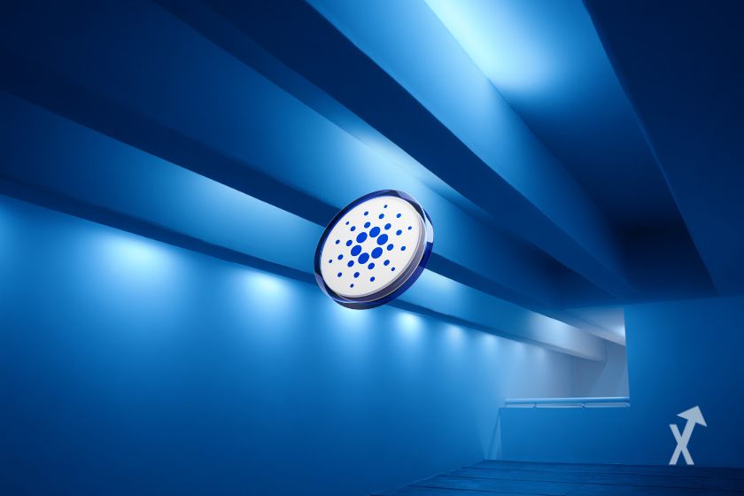 Le token de Cardano au centre d'une pièce toute bleue illuminée