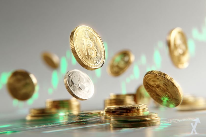 plusieurs coins 3D crypto en train de tomber sur fond gris