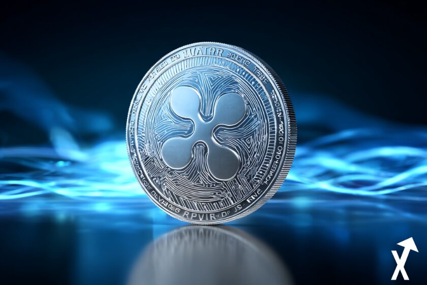 xrp coin argenté sur fond bleu foncé et clair