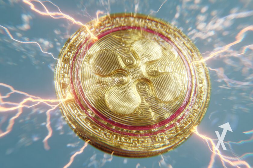 coin XRP en jaune avec électricité rouge autour dans un fond bleu