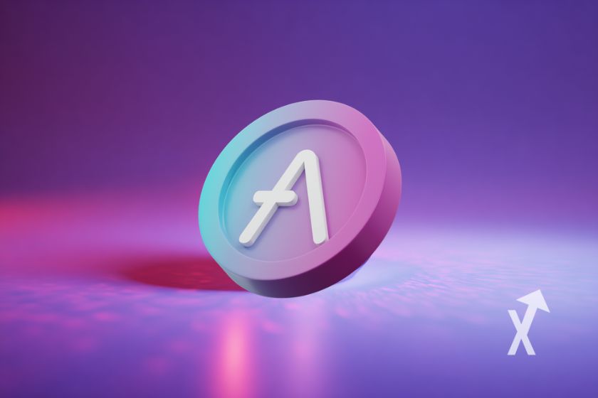 coin AAVE en rose sur un fond violet et rose evec de la lumière