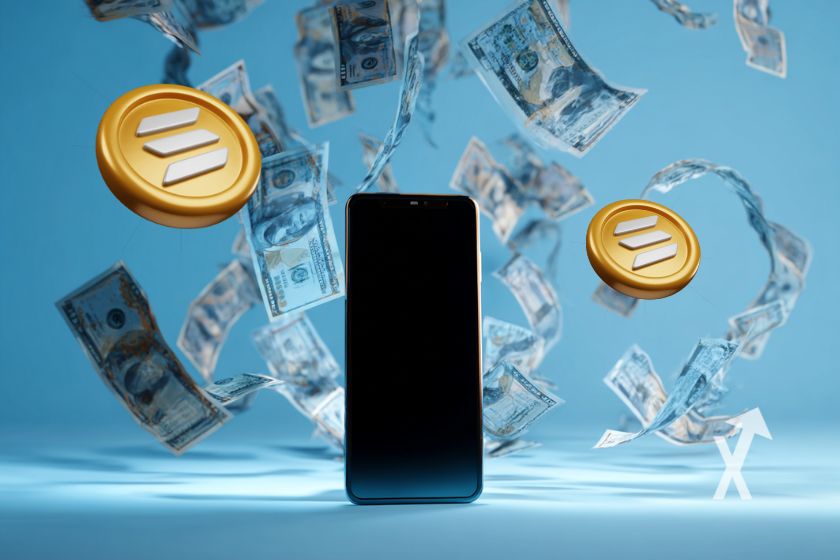 Téléphone noir sur un fond bleu avec deux coins Solana jaunes autour et des billets dollars