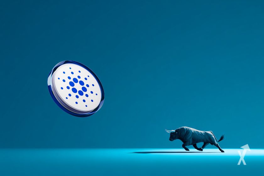 Le token blanc de Cardano sur un fond bleu avec un taureau en train de courir vers la gauche