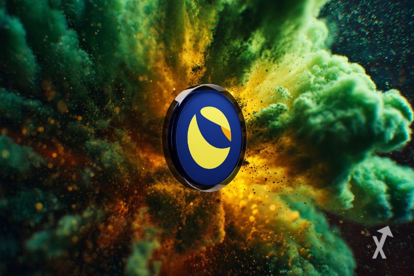 Le token LUNA devant une explosion verte et jaune