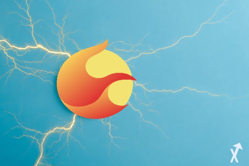 logo terra luna sur fond bleu avec des éclairs jaunes autour