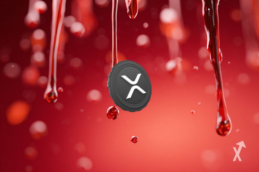 Le token gris avec le logo XRP sur un fond rouge avec des liquides tombant
