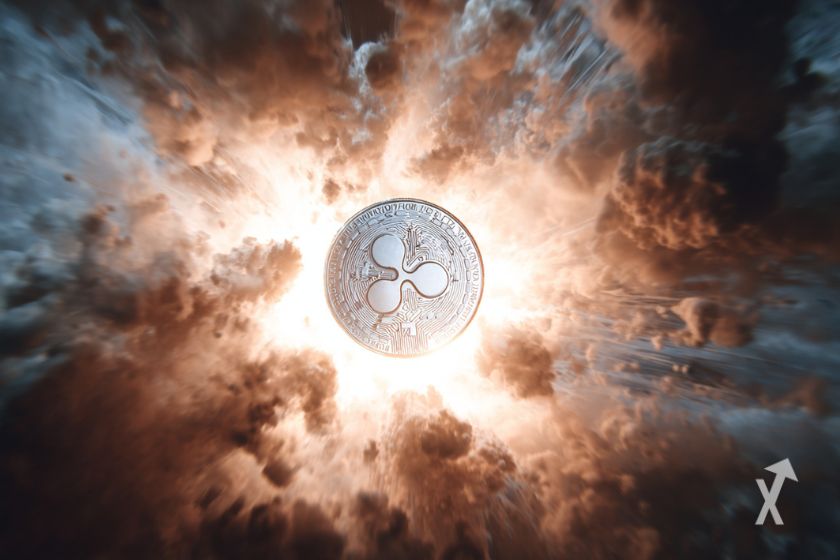 Une pièce en argent avec le logo de XRP devant une explosion de fumée