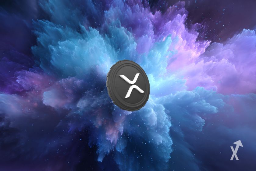 Le token gris de XRP sur un fond d'explosion bleue et violette