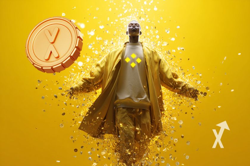 Homme en costume jaune sur un fond jaune qui regarde le ciel avec un coin XRP à gauche qui vole