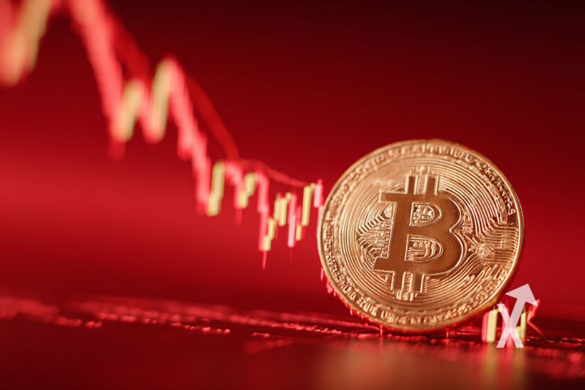 coin Bitcoin sur un fond rouge avec trenleine jaune et rouge derrière