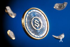 coin USDC Circle sur fond bleu avec des billets dollars