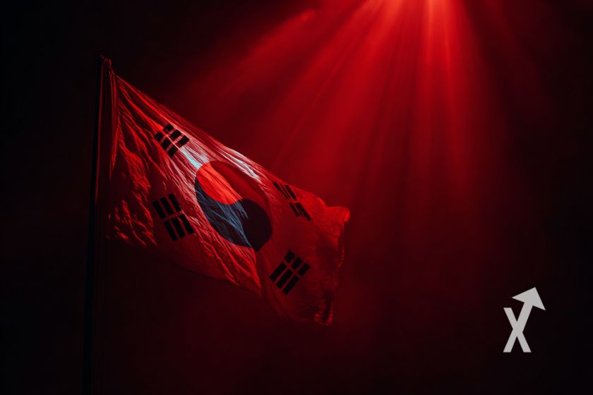drapeau corée du sud sur un fond rouge et noir avec lumière rouge
