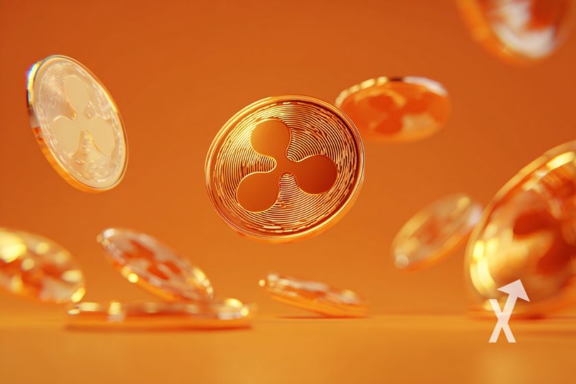 xrp coins dans les airs en orange sur un fond orange