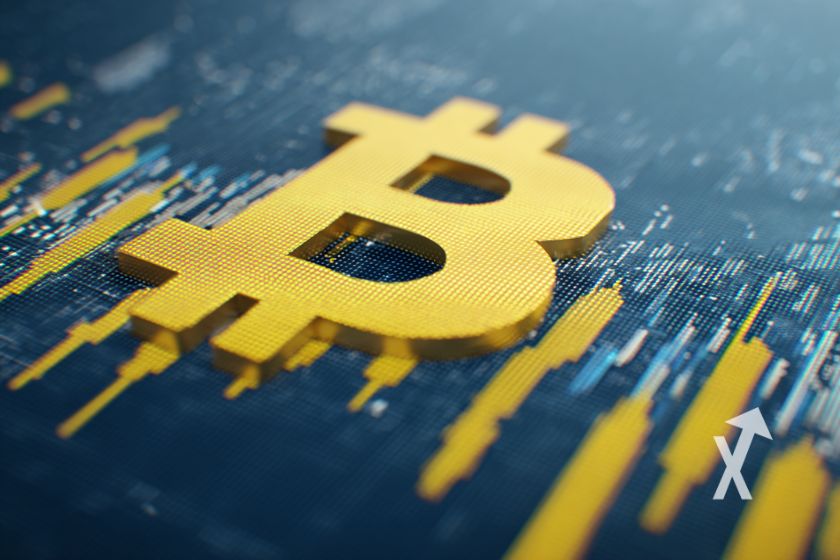 Bitcoin logo jaune avec bougies trading jaune sur un fond bleu marché boursier