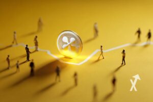 Xrp coin sur un fond jaune avec des petits bonhommes autour