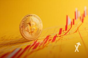 Bitcoin coin sur un fond orange avec trendline de bougies rouges