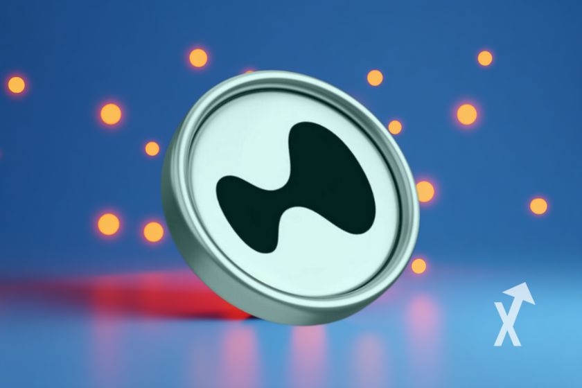 "M&uuml;nze hyperliquid HYPE auf blauem Grund"