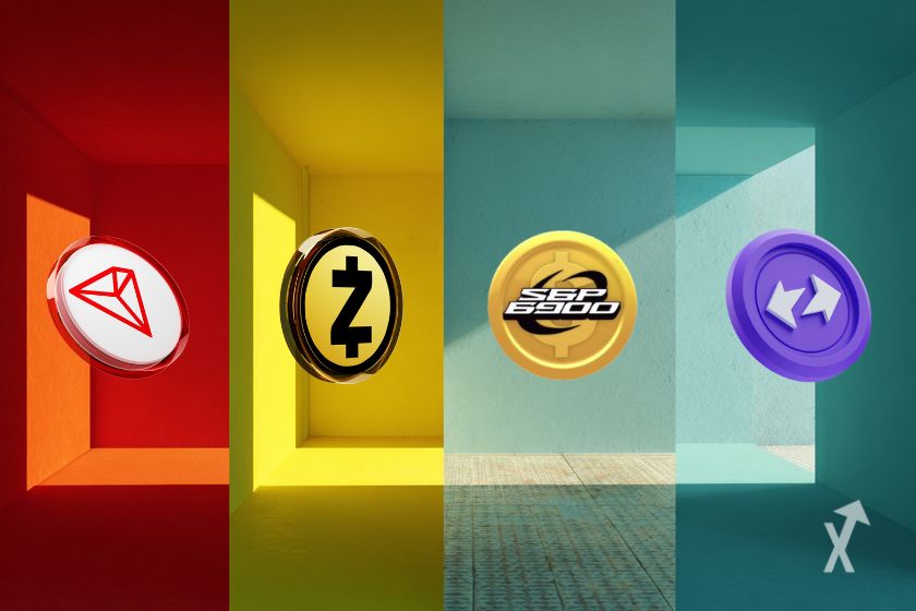 "Four crypto tokens on multicolored background"