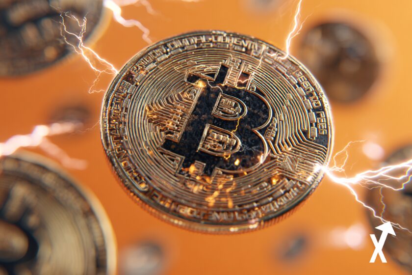 bitcoin coin dor&eacute; sur fond orange electrique