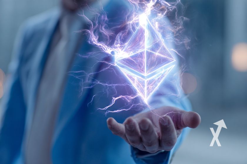 Ethereum logo dans la main d'un homme en costume bleu avec &eacute;lectricit&eacute;